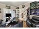 Home office area with dual desks, and a chair that sits on hardwood floor at 5942 Tioga Ct, Bargersville, IN 46106