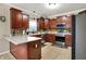 Kitchen with stainless steel appliances, tile backsplash, and breakfast bar at 5942 Tioga Ct, Bargersville, IN 46106