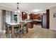 Open concept kitchen with stainless appliances view to dining and living spaces at 5942 Tioga Ct, Bargersville, IN 46106