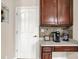 Kitchen counter with coffee maker and access door at 5942 Tioga Ct, Bargersville, IN 46106