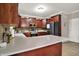 Bright kitchen boasts stainless steel appliances and extended countertops at 5942 Tioga Ct, Bargersville, IN 46106