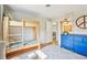 Sunlit bedroom with hardwood floors, bunk beds, and blue dresser with ample storage at 5987 E 100 N, Franklin, IN 46131