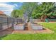 Inviting backyard garden area, perfect for green thumbs, with raised garden beds and lovely landscaping at 5987 E 100 N, Franklin, IN 46131