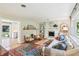 Cozy living room featuring a white brick fireplace and comfortable seating at 5987 E 100 N, Franklin, IN 46131