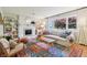 Bright living room with fireplace, large windows and stylish decor at 5987 E 100 N, Franklin, IN 46131