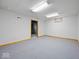 Finished basement area with neutral walls, carpet and door frame at 6086 W 850 S, Edinburgh, IN 46124