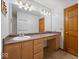 Bathroom with long countertop and traditional cabinetry at 6086 W 850 S, Edinburgh, IN 46124