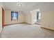 Spacious bedroom with neutral walls, carpeting and a cozy window seat at 6086 W 850 S, Edinburgh, IN 46124