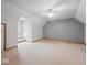 Large bonus room with neutral colors and natural light at 6086 W 850 S, Edinburgh, IN 46124