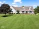 Charming two-story home with a large front yard and inviting porch at 6086 W 850 S, Edinburgh, IN 46124