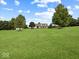 Expansive property with lush lawn, mature trees, and charming home at 6086 W 850 S, Edinburgh, IN 46124
