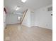 Open-concept living area with laminate flooring and natural light at 6086 W 850 S, Edinburgh, IN 46124