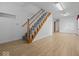 Staircase and wood laminate flooring leading to the upper level at 6086 W 850 S, Edinburgh, IN 46124