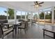 Lovely sunroom with many windows and access to deck and backyard at 6086 W 850 S, Edinburgh, IN 46124
