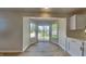 Breakfast nook with sliding glass doors that offers natural light and backyard access at 6420 Greenspire Pl, Indianapolis, IN 46221
