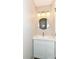 Updated powder room with vanity, modern fixture and faucet at 6837 W Burlington Dr, McCordsville, IN 46055