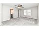 Bedroom with neutral walls, plush carpeting, and access to the ensuite bathroom at 6837 W Burlington Dr, McCordsville, IN 46055