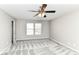 Bedroom featuring neutral walls, plush gray carpeting, and a ceiling fan at 6837 W Burlington Dr, McCordsville, IN 46055