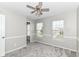 Bedroom features plush carpet, natural light from two windows, and a ceiling fan at 6837 W Burlington Dr, McCordsville, IN 46055