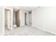 Hallway featuring neutral walls, carpeting, and open doorways at 6837 W Burlington Dr, McCordsville, IN 46055