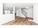 Spacious living room featuring new wood flooring and neutral paint, creating a welcoming atmosphere at 6837 W Burlington Dr, McCordsville, IN 46055