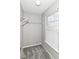 Small walk-in closet featuring carpet, a window, and wire shelving at 6837 W Burlington Dr, McCordsville, IN 46055