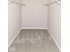 Empty walk-in closet featuring neutral walls, carpet, and wire shelving at 6837 W Burlington Dr, McCordsville, IN 46055