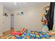 bedroom featuring hardwood floors, a ceiling fan, and playful decor at 7 Lake Hart, Mooresville, IN 46158