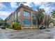 Beautiful brick apartment building featuring large windows and manicured landscaping at 735 Lexington Ave # Apt 27, Indianapolis, IN 46203