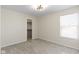 Neutral bedroom with a window for natural light and view of the backyard at 7907 Oakdale Ln, Indianapolis, IN 46214