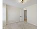 Bedroom featuring modern lighting, with carpet flooring, and a door leading to closet and hallway at 7907 Oakdale Ln, Indianapolis, IN 46214