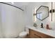 Updated bathroom with modern vanity, stylish mirror, and walk-in shower at 8049 Burn Ct, Indianapolis, IN 46217