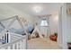 Bright, whimsically decorated Bedroom with a mural, teepee, and crib at 8049 Burn Ct, Indianapolis, IN 46217
