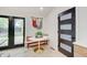 Cozy breakfast nook featuring modern doors and view to backyard at 8049 Burn Ct, Indianapolis, IN 46217