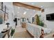 Bright, open-concept living room with vaulted ceilings, modern decor, and stylish furnishings at 8049 Burn Ct, Indianapolis, IN 46217