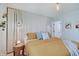 Spacious main bedroom with linen curtains, neutral color palette, and modern lighting at 8049 Burn Ct, Indianapolis, IN 46217