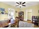 Cozy dining room with hardwood floors and open access to the living spaces and kitchen at 844 N Emerson Ave, Indianapolis, IN 46219