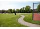 Outdoor park featuring a basketball court and scenic walking path at 9718 Jupiter Pass, Carmel, IN 46032