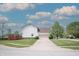 Charming home featuring a well-maintained lawn, two-car garage, and a delightful back deck at 9718 Jupiter Pass, Carmel, IN 46032