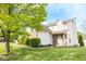 Charming two-story home with a brick facade, well-maintained lawn, and beautiful landscaping at 9718 Jupiter Pass, Carmel, IN 46032