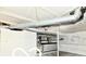 Unfinished basement with exposed ductwork and painted walls at 1014 W 32Nd St, Indianapolis, IN 46208