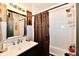 Bathroom features a tub with shower and white subway tile at 1014 W 32Nd St, Indianapolis, IN 46208