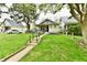 Charming single-story home with inviting front porch and well-maintained lawn at 1014 W 32Nd St, Indianapolis, IN 46208