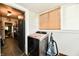 Convenient laundry area features a modern washer, natural light, and easy access to the home's interior at 1014 W 32Nd St, Indianapolis, IN 46208
