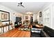 Spacious living room with hardwood floors and ample seating at 1014 W 32Nd St, Indianapolis, IN 46208