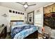 Bedroom with a ceiling fan and bright natural light at 1014 W 32Nd St, Indianapolis, IN 46208