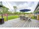 Spacious deck with patio furniture and backyard views of the red barn at 10805 Charlemagne Dr, Indianapolis, IN 46259