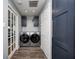 Modern laundry room with stainless steel appliances and tiled flooring at 10805 Charlemagne Dr, Indianapolis, IN 46259