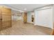 Finished basement with new flooring, and access to a bathroom and other rooms at 1105 Wild Ridge Blvd, Brownsburg, IN 46112