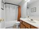 Bathroom with bathtub and shower combination features neutral walls, and a single sink at 1105 Wild Ridge Blvd, Brownsburg, IN 46112